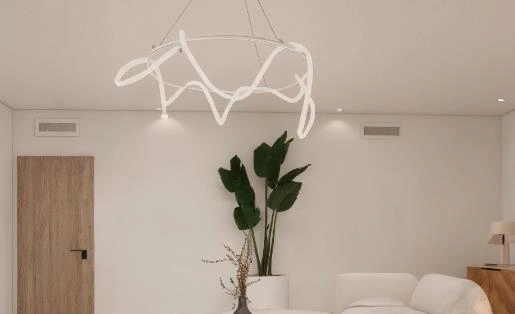 Curved white pendant light in modern loft, minimalist artistic lighting design.