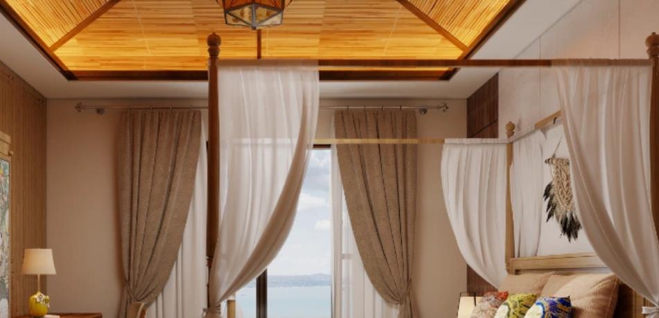 Glowing orange ceiling creates warm, Southeast Asian inspired bedroom.