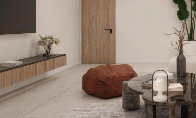 Bean bag sofa in small living room, soft and compact, cozy corner for relaxation.