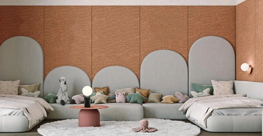 Plush toy bridge between twin beds.