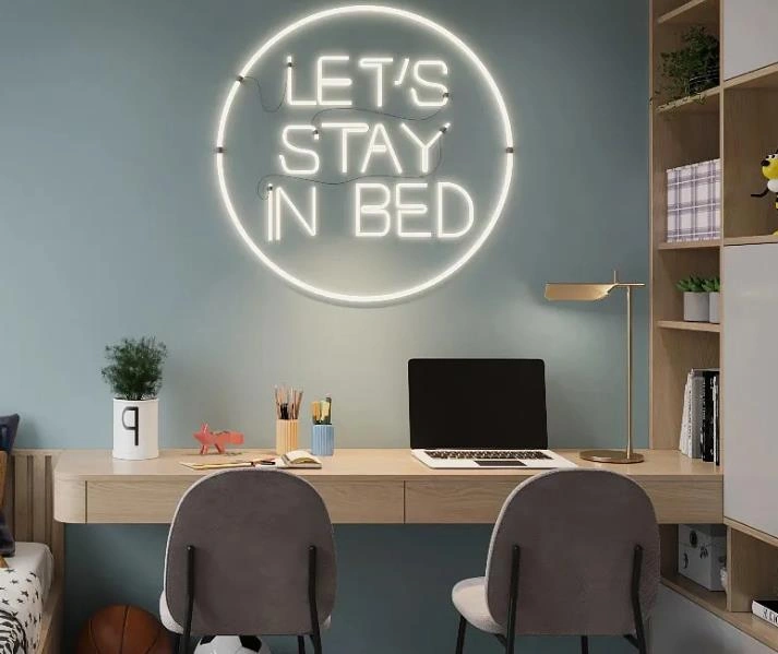 Colorful neon light strip in a children’s room.