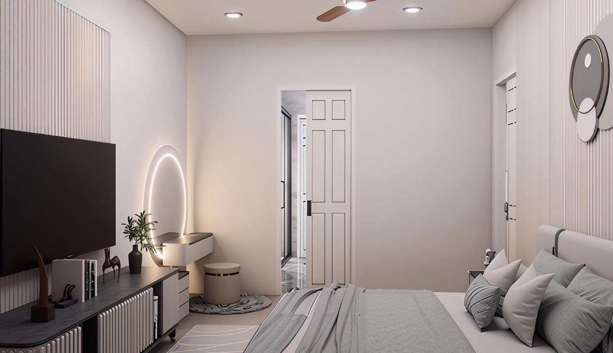 A cozy master bedroom with a wall-mounted TV facing the bed