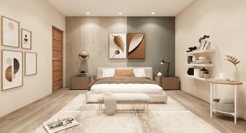 A gray master bedroom highlighted with vibrant blue pillows and blankets